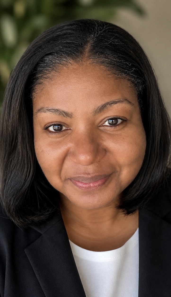 Raven Davis wearing a black blazer and white top